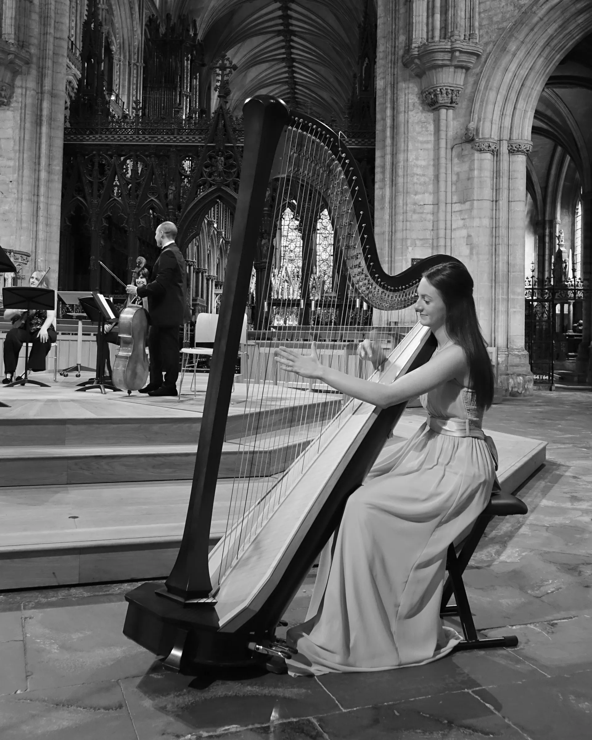 Annest Davies playing the harp in Ely Cathedral