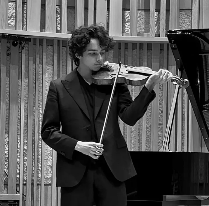 George Lawson playing the violin