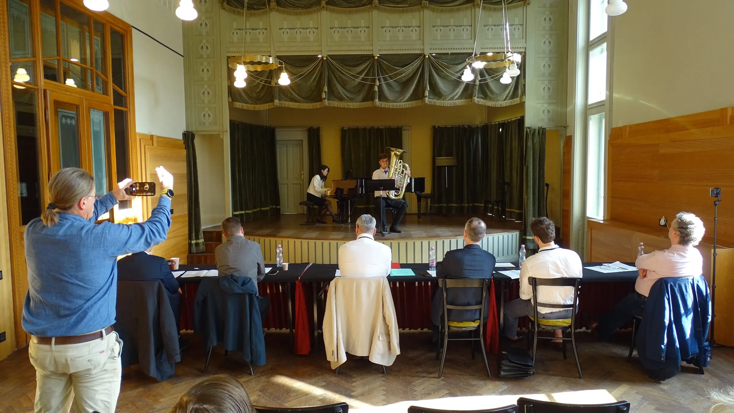 The competition hall at the Liszt Academy, with the judges in the background