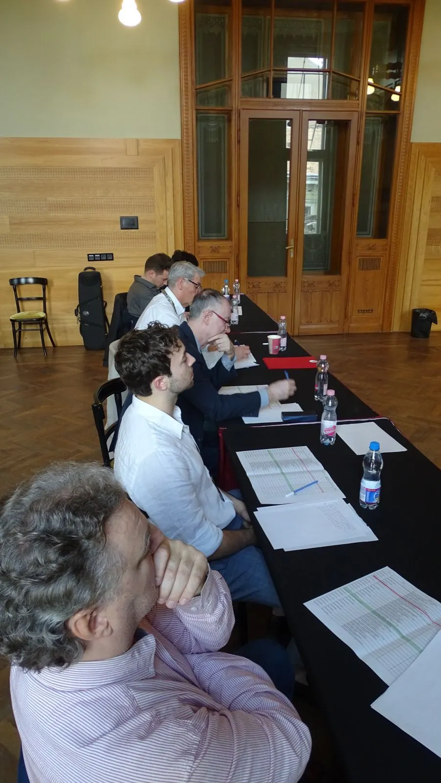 The jury at their table with score sheets during the National Brass Competitions at the Liszt Academy