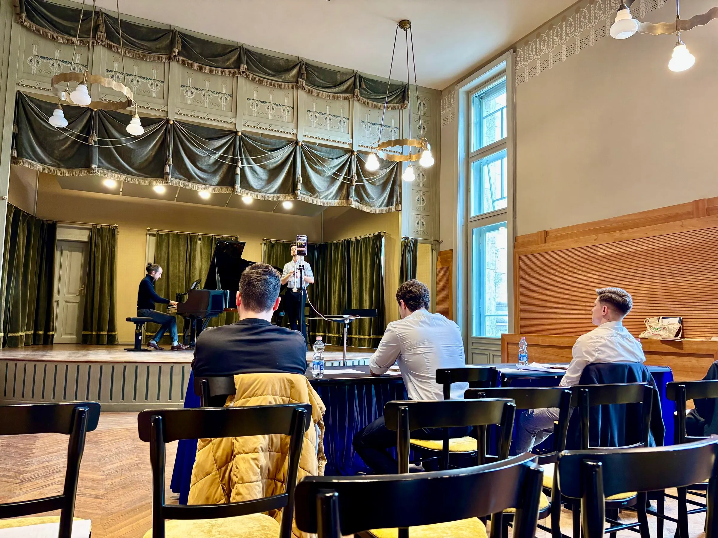 The recital hall at the Liszt Academy, with the judges' table in front of the stage